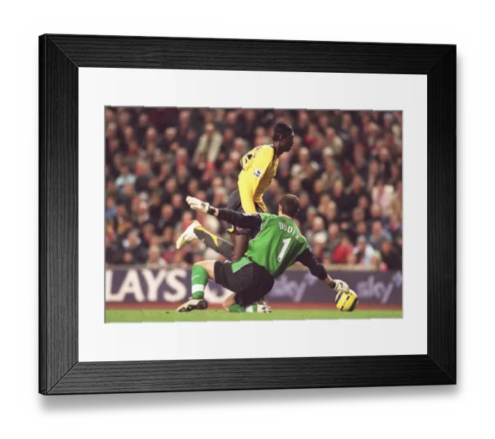 Framed Print : Emmanuel Adebayor (Arsenal) Jerzy Dudek (Liverpool). Liverpool 1: 0 Arsenal