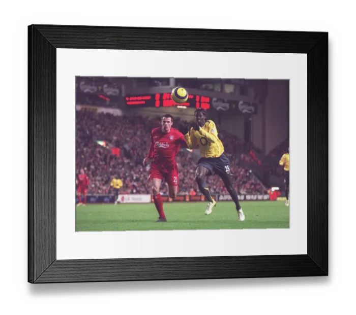 Framed Print : Emmanuel Adebayor (Arsenal) Jamie Carragher (Liverpool). Liverpool 1: 0 Arsenal
