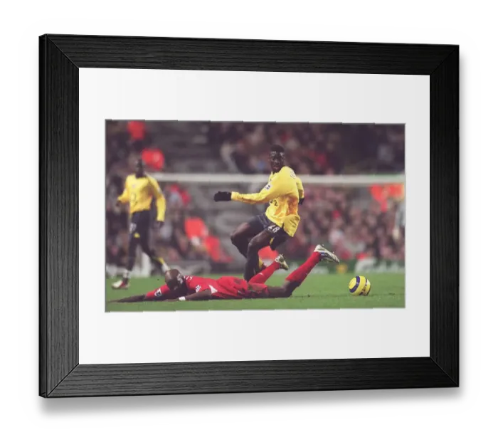 Framed Print : Clash of Titans: Kolo Toure vs. Momo Sissoko - Liverpool's 1-0 Victory over Arsenal, FA Premiership, 2006