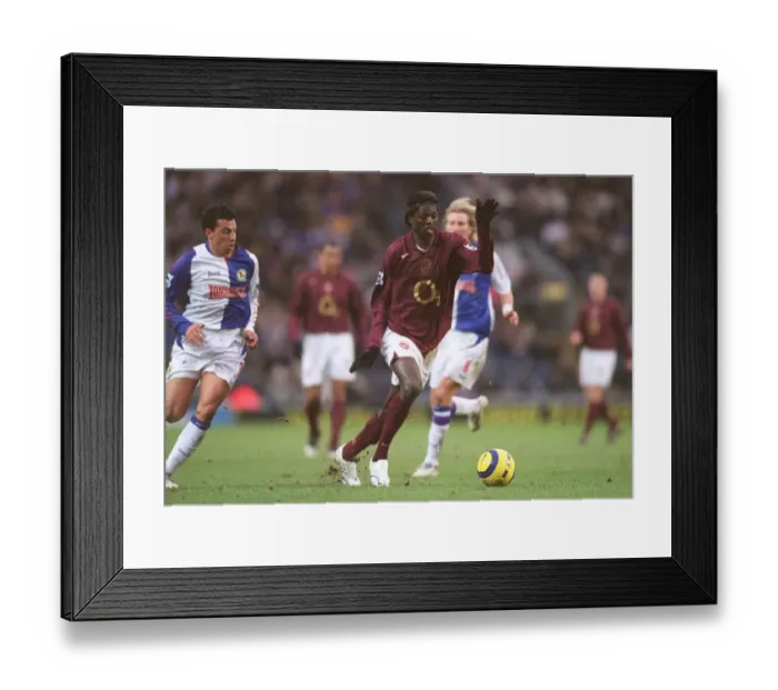 Framed Print : Emmanuel Adebayor (Arsenal) Sergio Peter (Blackburn) Framed Print : Emmanuel Adebayor (Arsenal) Sergio Peter (Blackburn)