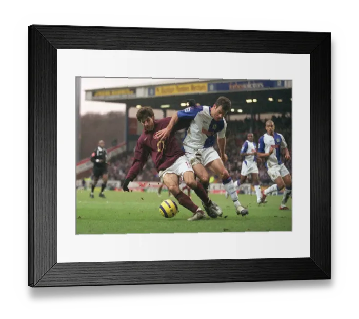 Framed Print : Cesc Fabregas (Arsenal) Ryan Nelsen (Blackburn). Blackburn Rovers 1: 0 Arsenal Framed Print : Cesc Fabregas (Arsenal) Ryan Nelsen (Blackburn). Blackburn Rovers 1: 0 Arsenal
