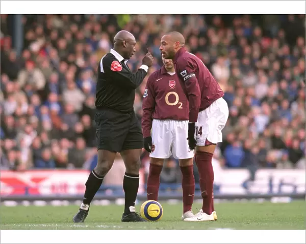 Thierry Henry (Arsenal) is told to wait for the whistle by Referee U. Rennie