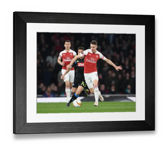 Framed Print : Arsenal's Aaron Ramsey Breaks Past Napoli's Dries Mertens in Europa League Quarterfinal Clash Framed Print : Arsenal's Aaron Ramsey Breaks Past Napoli's Dries Mertens in Europa League Quarterfinal Clash