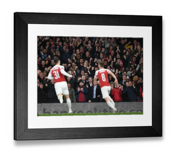 Framed Print : Arsenal Fans Euphoria: Goal Celebration vs. S.S.C. Napoli in Europa League Quarterfinal
