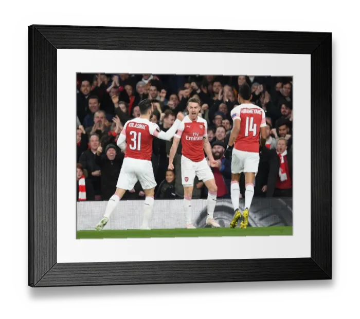 Framed Print : Arsenal's Aaron Ramsey Scores First Goal in Europa League Quarterfinal vs. Napoli