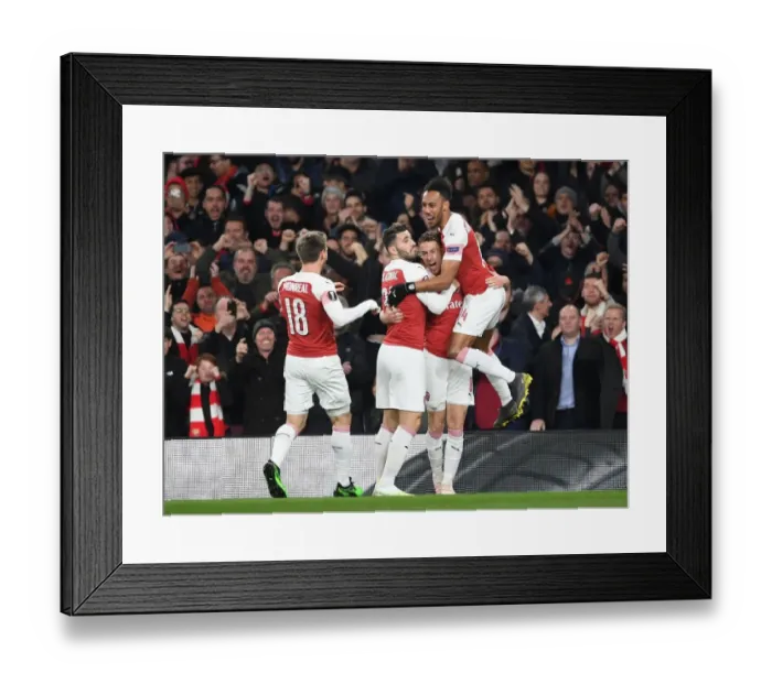 Framed Print : Arsenal Celebrate Aaron Ramsey's Goal vs S.S.C. Napoli in Europa League Quarterfinal