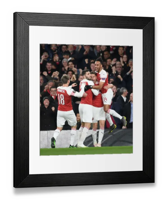 Framed Print : Arsenal's Europa League Victory: Ramsey's Goal Sparks Celebrations Against Napoli Framed Print : Arsenal's Europa League Victory: Ramsey's Goal Sparks Celebrations Against Napoli
