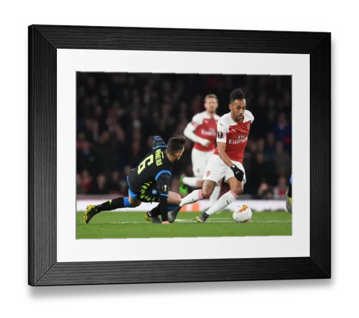 Framed Print : Arsenal's Aubameyang Outmaneuvers Napoli's Rui in Europa League Quarterfinal Clash Framed Print : Arsenal's Aubameyang Outmaneuvers Napoli's Rui in Europa League Quarterfinal Clash