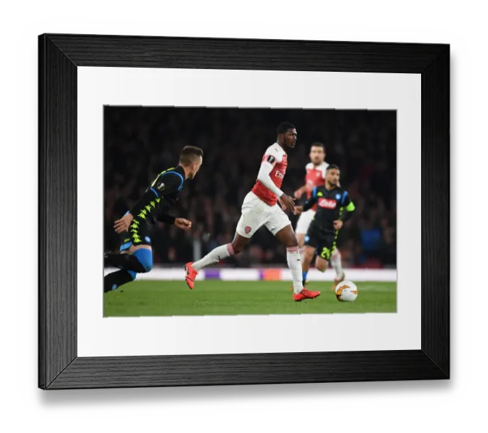 Framed Print : Arsenal's Ainsley Maitland-Niles Outsmarts Napoli's Mario Rui in Europa League Showdown Framed Print : Arsenal's Ainsley Maitland-Niles Outsmarts Napoli's Mario Rui in Europa League Showdown