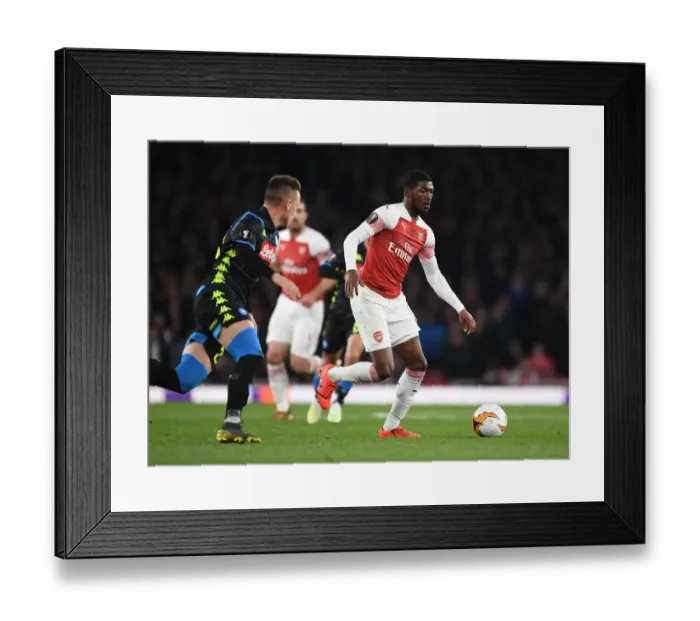 Framed Print : Arsenal vs. Napoli: Ainsley Maitland-Niles Breaks Past Mario Rui in Europa League Quarterfinal