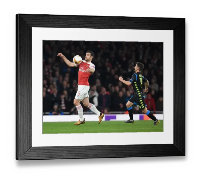 Framed Print : Arsenal's Europa League Battle: Sokratis Faces Napoli in Quarterfinals Framed Print : Arsenal's Europa League Battle: Sokratis Faces Napoli in Quarterfinals