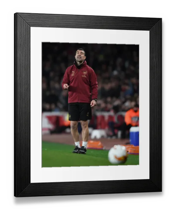 Framed Print : Arsenal vs. S.S.C. Napoli - UEFA Europa League Quarterfinal: Juan Carlos Carcedo Guides Arsenal at Emirages Stadium Framed Print : Arsenal vs. S.S.C. Napoli - UEFA Europa League Quarterfinal: Juan Carlos Carcedo Guides Arsenal at Emirages Stadium