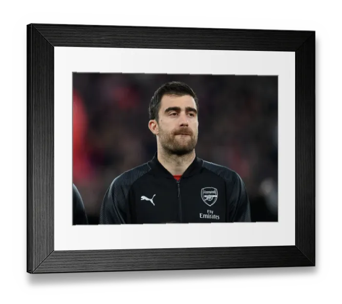 Framed Print : Arsenal's Sokratis Prepares for Europa League Battle against Napoli