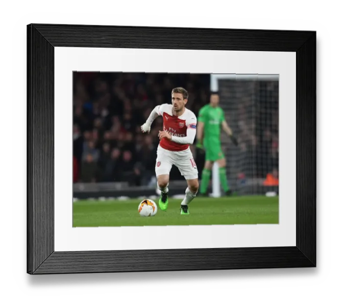 Framed Print : Monreal in Action: Arsenal vs. Napoli, UEFA Europa League Quarterfinal at Emirates Stadium