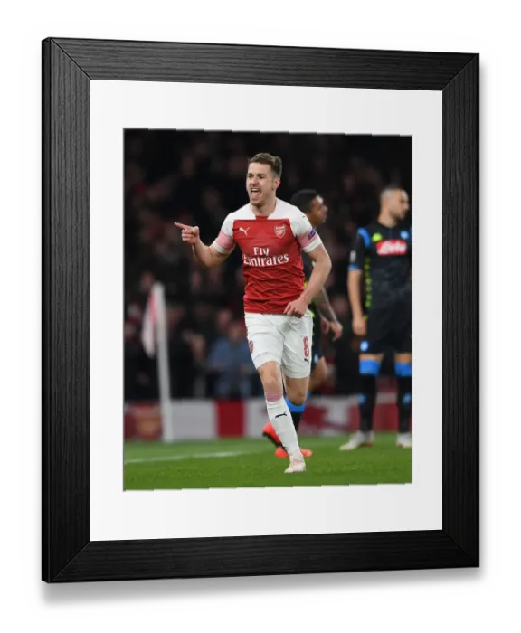 Framed Print : Aaron Ramsey's Dramatic Goal: Arsenal's Europa League Quarterfinal Victory over Napoli