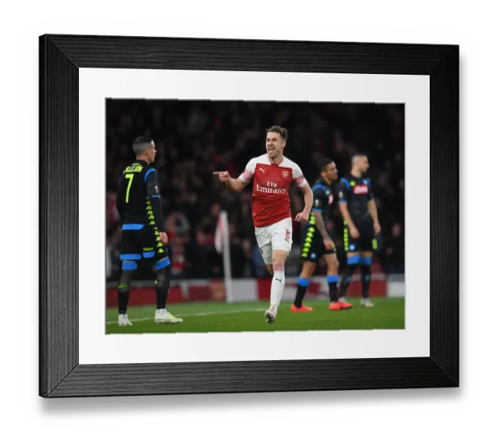 Framed Print : Ramsey's Dramatic Goal: Arsenal Edge Past Napoli in Europa League Quarterfinal