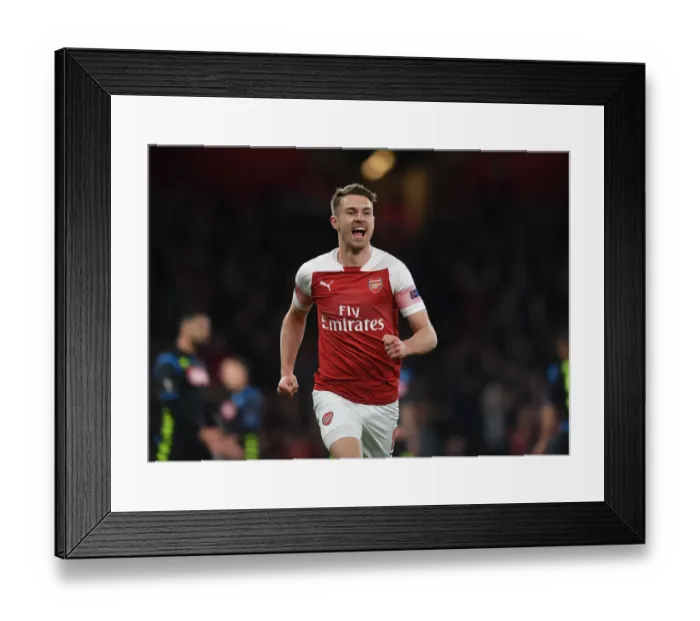 Framed Print : Arsenal's Aaron Ramsey Thrills with Stunner in Europa League Quarterfinal vs. Napoli