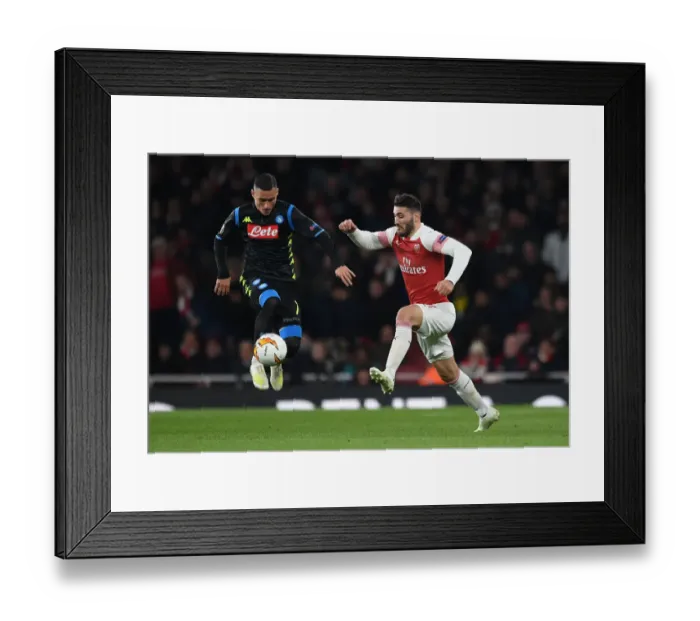 Framed Print : Kolasinac vs. Hysaj: A Europa League Showdown at the Emirates
