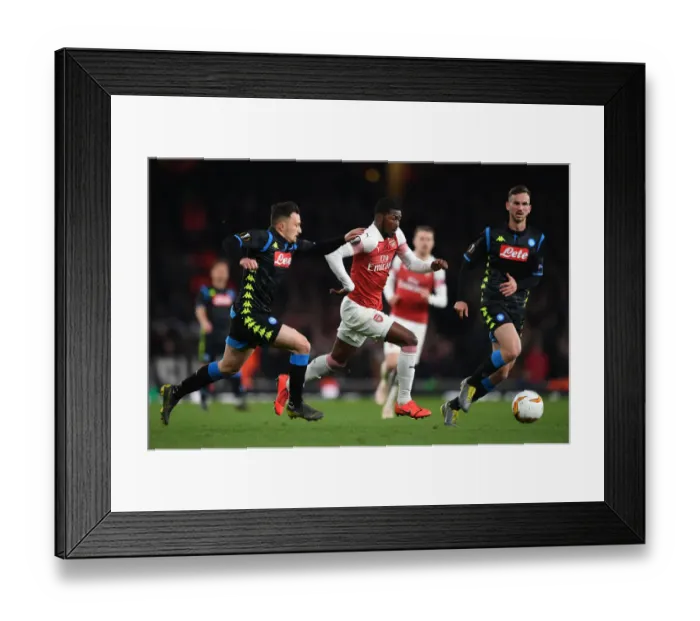 Framed Print : Arsenal's Ainsley Maitland-Niles Faces Off Against Napoli's Mario Rui and Fabian Ruiz in Europa League Quarterfinal Showdown Framed Print : Arsenal's Ainsley Maitland-Niles Faces Off Against Napoli's Mario Rui and Fabian Ruiz in Europa League Quarterfinal Showdown