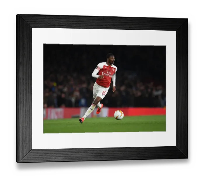 Framed Print : Arsenal's Ainsley Maitland-Niles in Europa League Action Against S.C. Napoli
