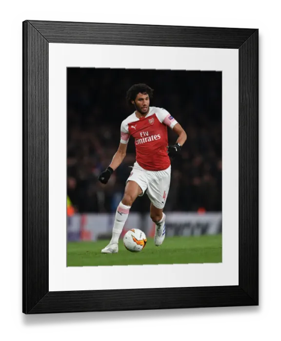 Framed Print : Arsenal vs. S.S.C. Napoli - Mohamed Elneny in Action during the 2018-19 Europa League Quarterfinal First Leg at Emirates Stadium