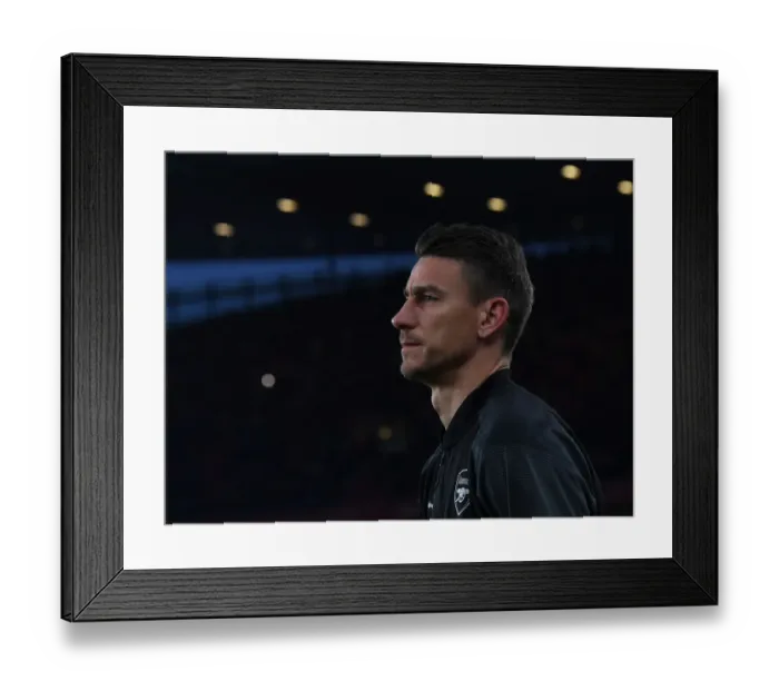 Framed Print : Arsenal's Laurent Koscielny: Focused Before Europa League Quarterfinal vs Napoli