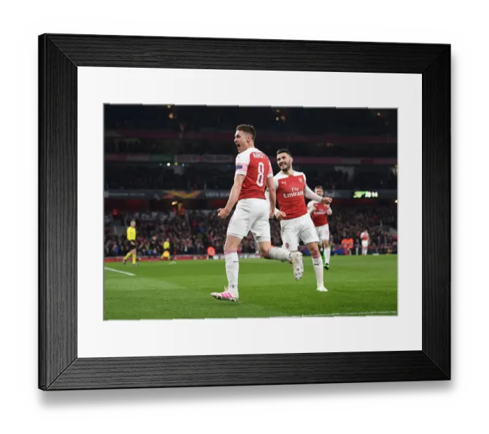 Framed Print : Arsenal's Europa League Triumph: Aaron Ramsey's Decisive Goal vs. Napoli