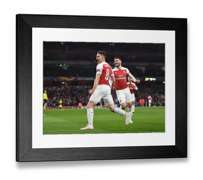 Framed Print : Ramsey's Europa League Heroics: Arsenal's Winning Goal vs. Napoli