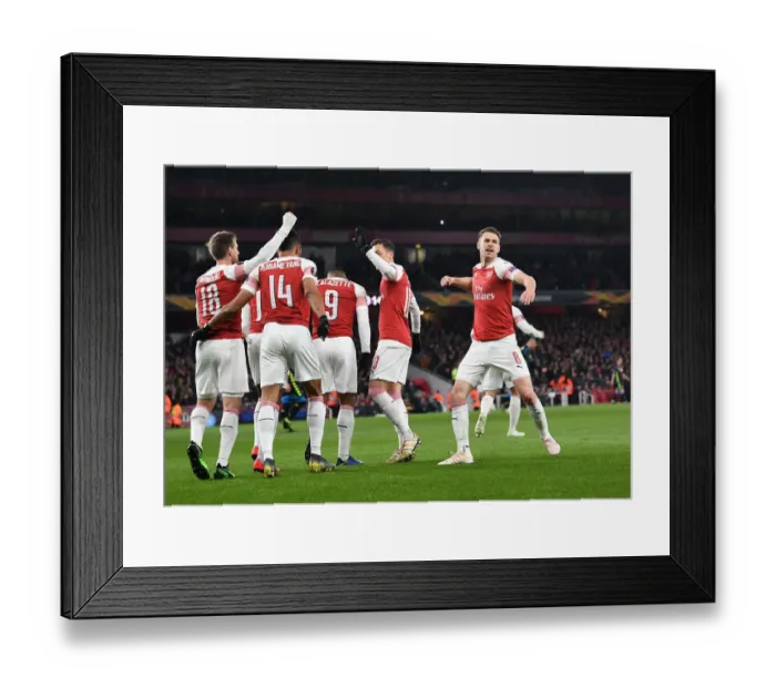 Framed Print : Aaron Ramsey's Dramatic Goal: Arsenal Tops Napoli in Europa League Quarterfinal