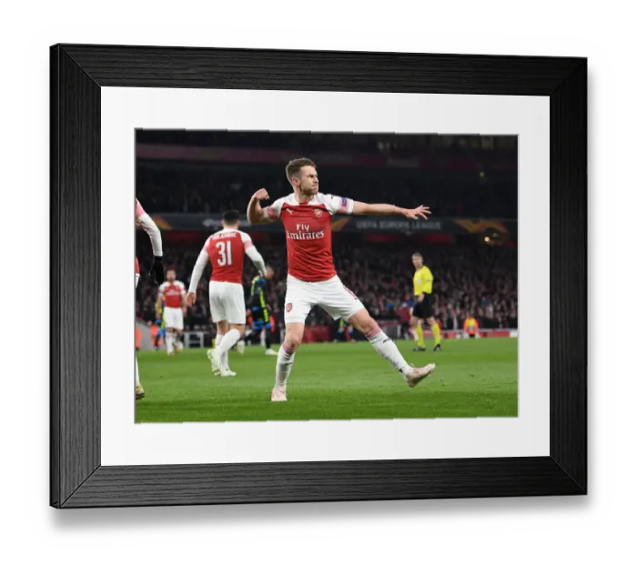 Framed Print : Ramsey's Dramatic Goal: Arsenal Secures Europa League Quarterfinal Victory Over Napoli