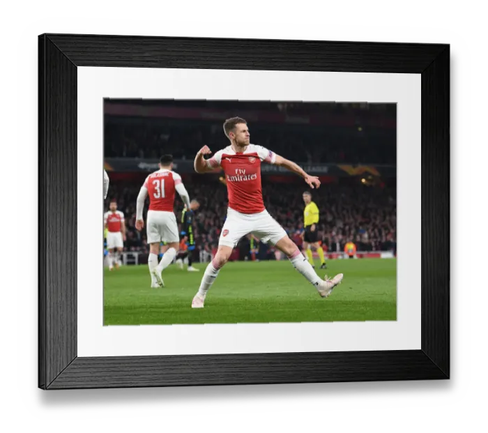 Framed Print : Aaron Ramsey's Goal Secures Arsenal's Europa League Quarterfinal Victory over Napoli