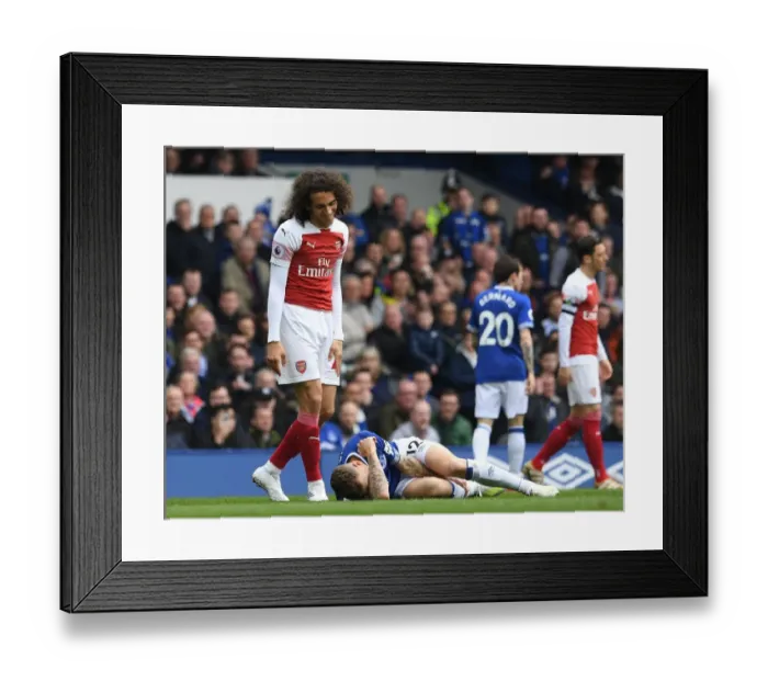Framed Print : Guendouzi vs. Digne: A Battle of Will in the Premier League Clash between Everton and Arsenal