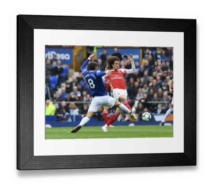 Framed Print : Clash of Midfield Titans: Guendouzi vs. Gomes - Everton vs. Arsenal, Premier League Framed Print : Clash of Midfield Titans: Guendouzi vs. Gomes - Everton vs. Arsenal, Premier League