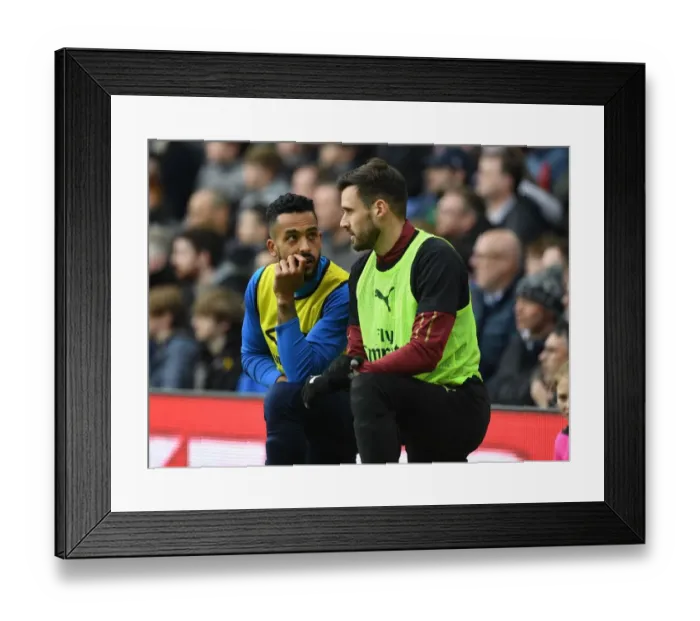 Framed Print : Arsenal Rivals Jenkinson and Walcott: A Moment of Sportsmanship on the Field Framed Print : Arsenal Rivals Jenkinson and Walcott: A Moment of Sportsmanship on the Field