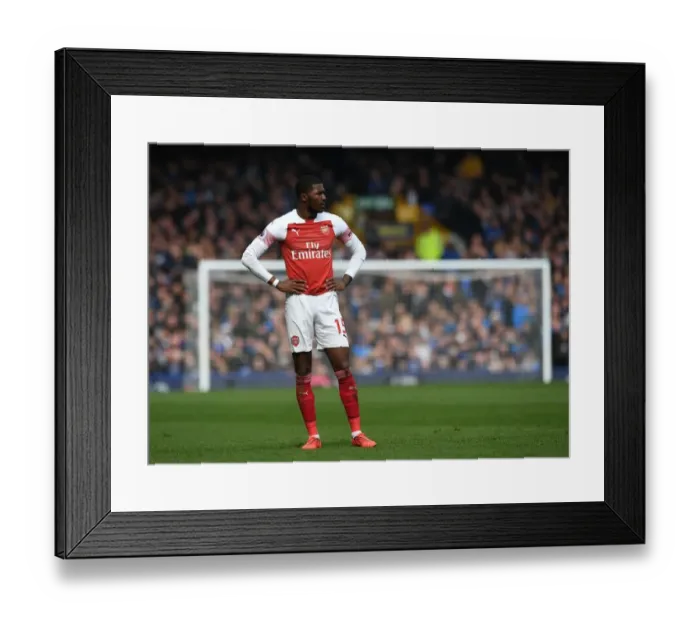 Framed Print : Maitland-Niles Stands Firm: Everton vs Arsenal, Premier League 2018-19 Framed Print : Maitland-Niles Stands Firm: Everton vs Arsenal, Premier League 2018-19