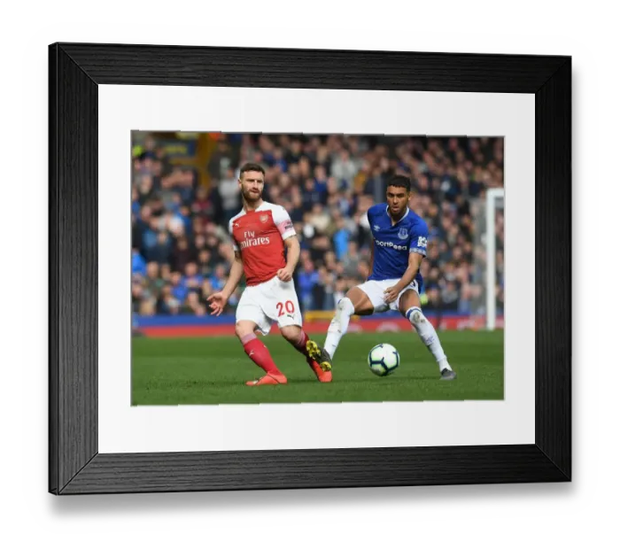 Framed Print : Mustafi Faces Off Against Calvert-Lewin: Everton vs Arsenal Premier League Clash