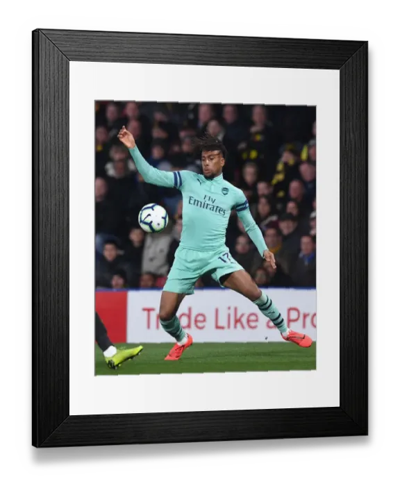 Framed Print : Arsenal's Alex Iwobi in Action against Watford in Premier League Clash (2018-19) Framed Print : Arsenal's Alex Iwobi in Action against Watford in Premier League Clash (2018-19)