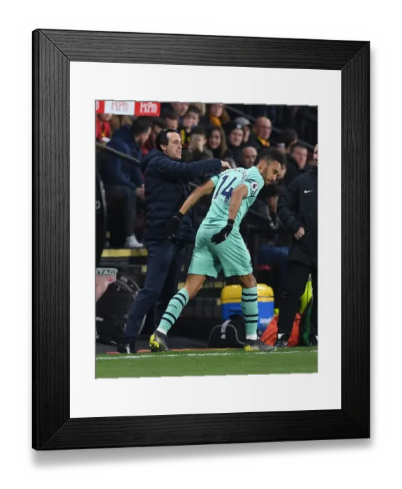 Framed Print : Aubameyang's Goal Celebration with Emery: Arsenal's Victory at Watford (2018-19)