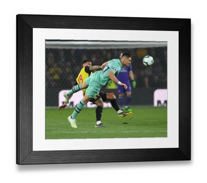 Framed Print : Mavropanos vs. Gray: A Premier League Showdown - Arsenal vs. Watford