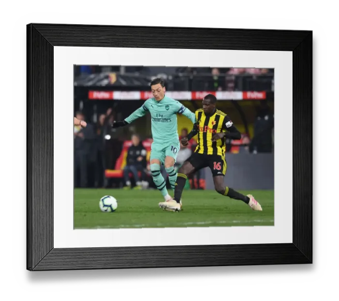 Framed Print : Mesut Ozil Breaks Past Doucoure: Watford vs. Arsenal, Premier League 2018-19 Framed Print : Mesut Ozil Breaks Past Doucoure: Watford vs. Arsenal, Premier League 2018-19