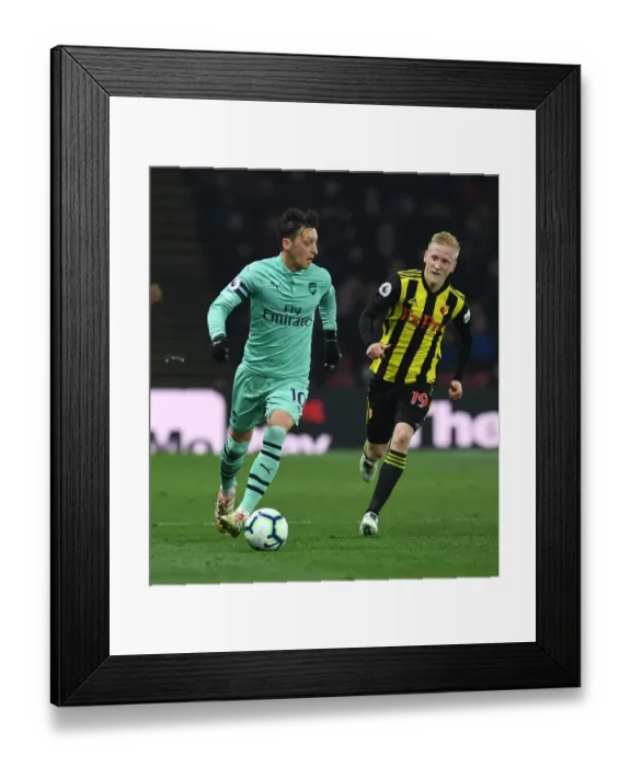 Framed Print : Mesut Ozil Breaks Past Will Hughes: Watford vs Arsenal, Premier League 2018-19 Framed Print : Mesut Ozil Breaks Past Will Hughes: Watford vs Arsenal, Premier League 2018-19