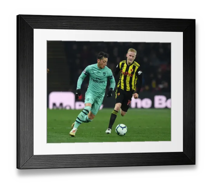 Framed Print : Mesut Ozil Outsmarts Will Hughes: A Premier League Battle at Vicarage Road (April 2019) Framed Print : Mesut Ozil Outsmarts Will Hughes: A Premier League Battle at Vicarage Road (April 2019)