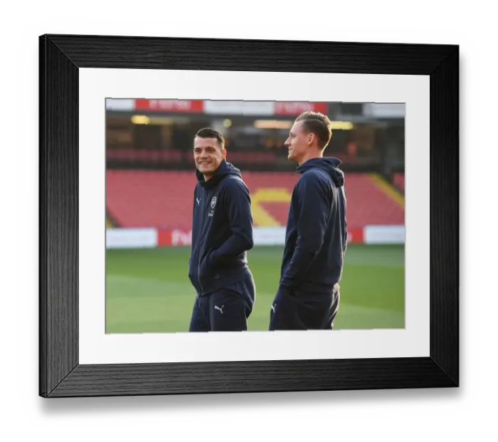 Framed Print : Arsenal's Xhaka and Leno Pre-Match Huddle: Watford vs Arsenal, Premier League 2018-19