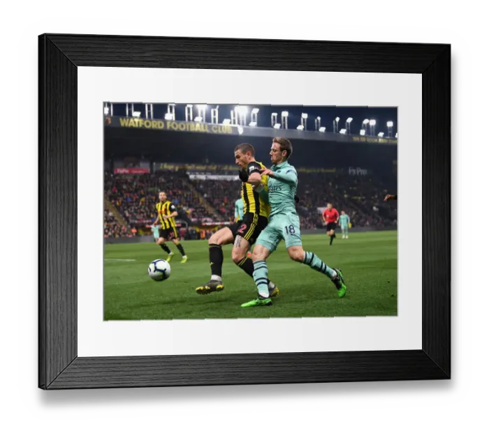 Framed Print : Nacho Monreal vs. Daryl Janmaat: Intense Battle in Watford v Arsenal Premier League Clash Framed Print : Nacho Monreal vs. Daryl Janmaat: Intense Battle in Watford v Arsenal Premier League Clash