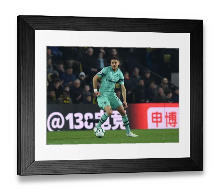 Framed Print : Arsenal's Mavropanos in Action against Watford in Premier League Clash (2018-19)