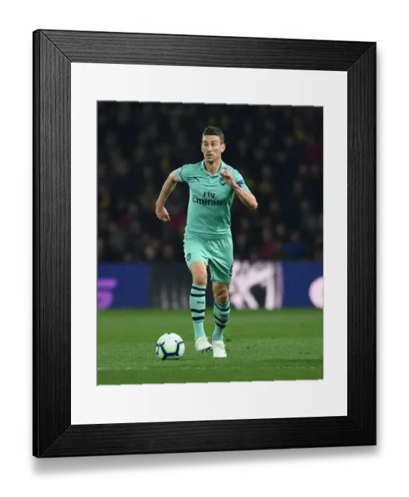 Framed Print : Laurent Koscielny Focuses in Arsenal's Victory Against Watford (Watford v Arsenal, Premier League 2018-19)