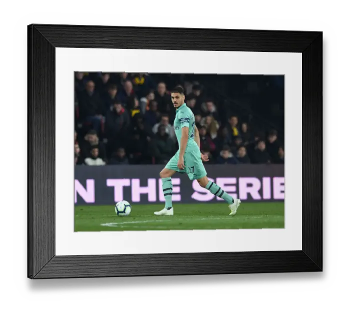 Framed Print : Arsenal's Mavropanos Faces Off Against Watford in Premier League Clash