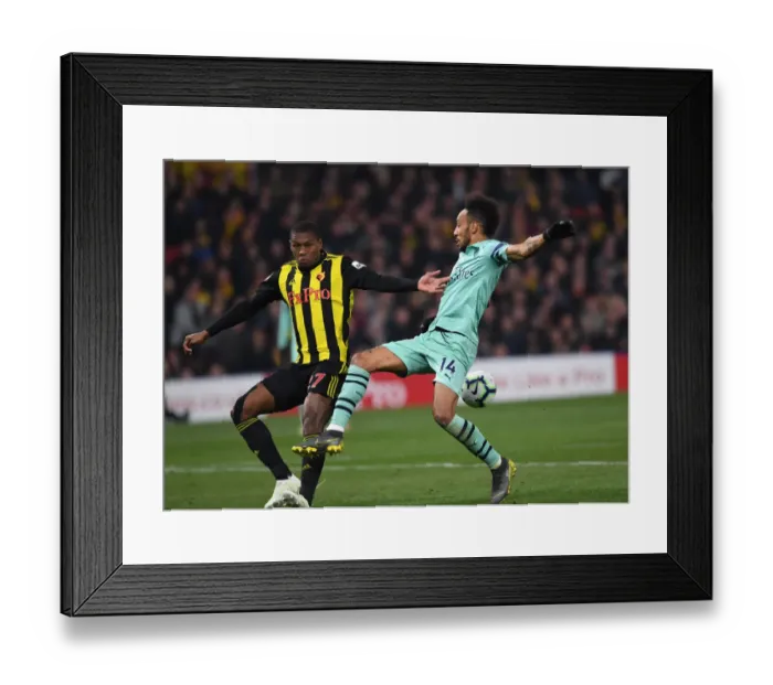 Framed Print : Aubameyang Faces Off Against Kabasele: Watford vs. Arsenal, Premier League 2018-19