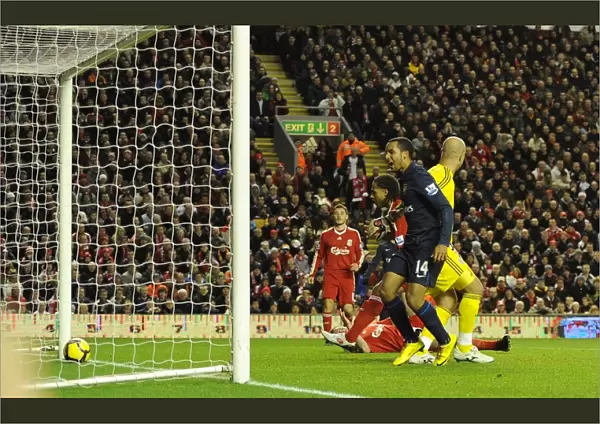Theo Walcott looks on as Glen Johnson put through his own net for the 1st Arsenal goal