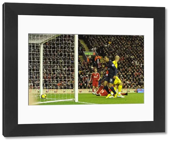 Theo Walcott looks on as Glen Johnson put through his own net for the 1st Arsenal goal
